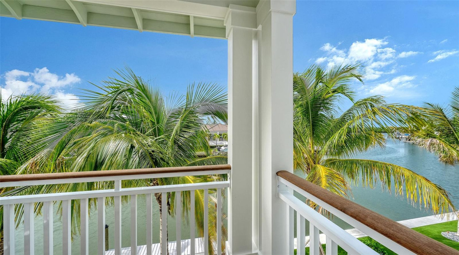 Open Balcony With Views Of Pool And Canal