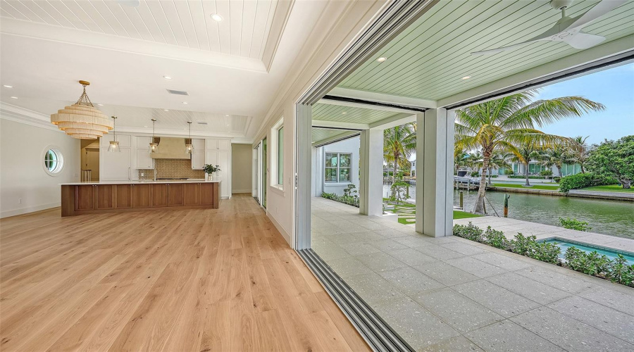 Step Inside The Expansive Great Room With Walls Of Glass And Covered Porches- The Epitome Of Indoor-Outdoor Luxury Island Living!