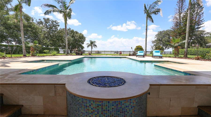 Gas Fire Pit With Seating In And Out Of The Water