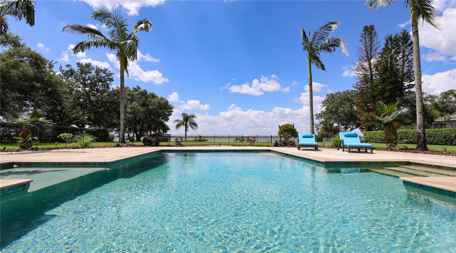 Salt Water Pebbletec  Pool Surrounded By Travertine Deck. (Propane Heated)