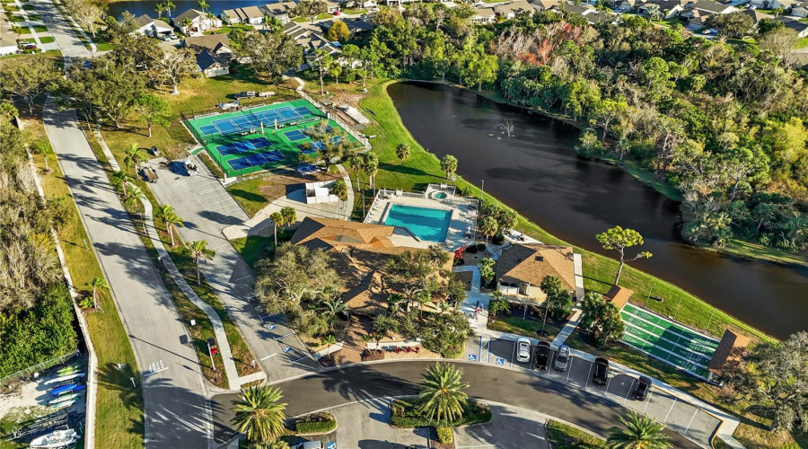 Aerial View Of The Front Of The Clubhouse, Tennis, Shuffle Board Courts And Pool In Park Forest.