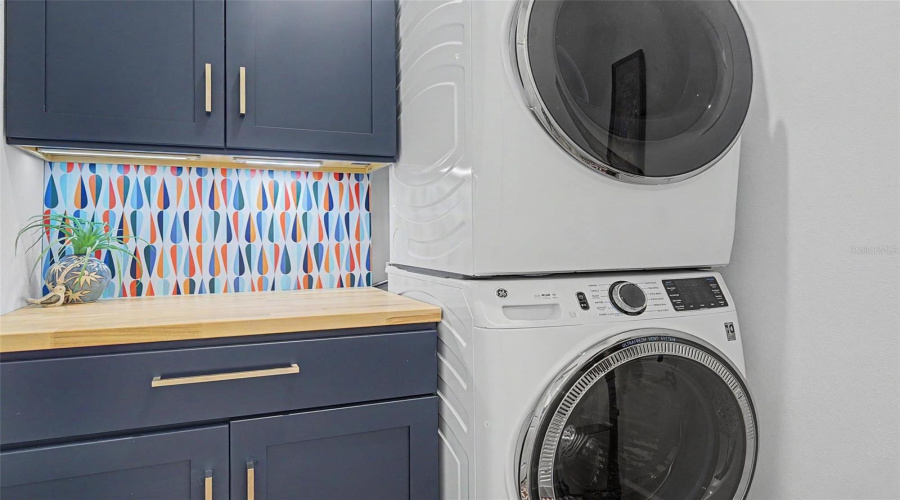 Laundry Room With Custom Cabinets