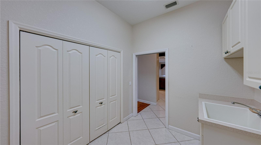 Large Inside Laundry Room With Extra Storage