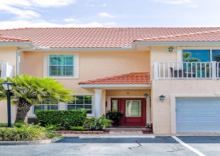 Front of condo - 2 spots and garage
