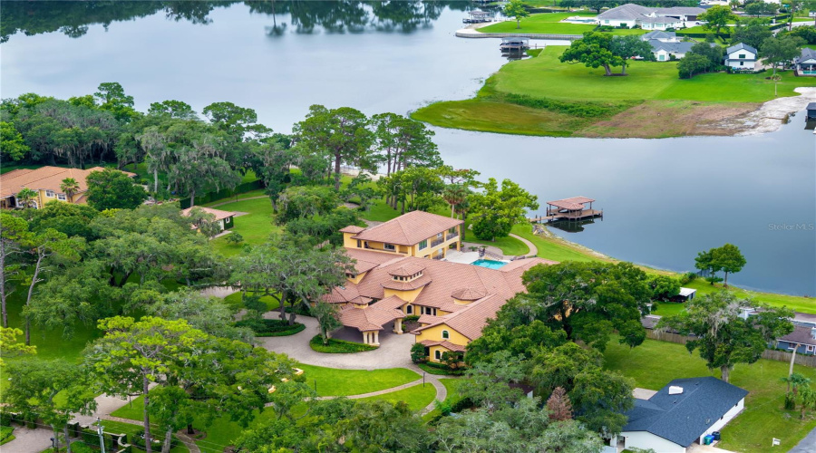 A Private Lake Mary, Fl Waterfront Sanctuary — This Extraordinary Lakefront Estate Delivers Resort-Caliber Luxury, Architectural Distinction And Rare Privacy Along The Shores Of Lake Mary In The Heart Of Seminole County.