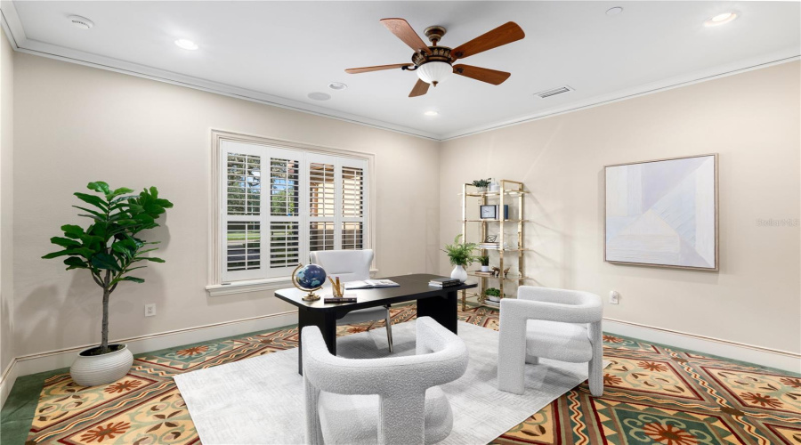 A Refined Private Executive Office With Tailored Architectural Details Offers An Elegant Setting For Working From This Lake Mary Estate.