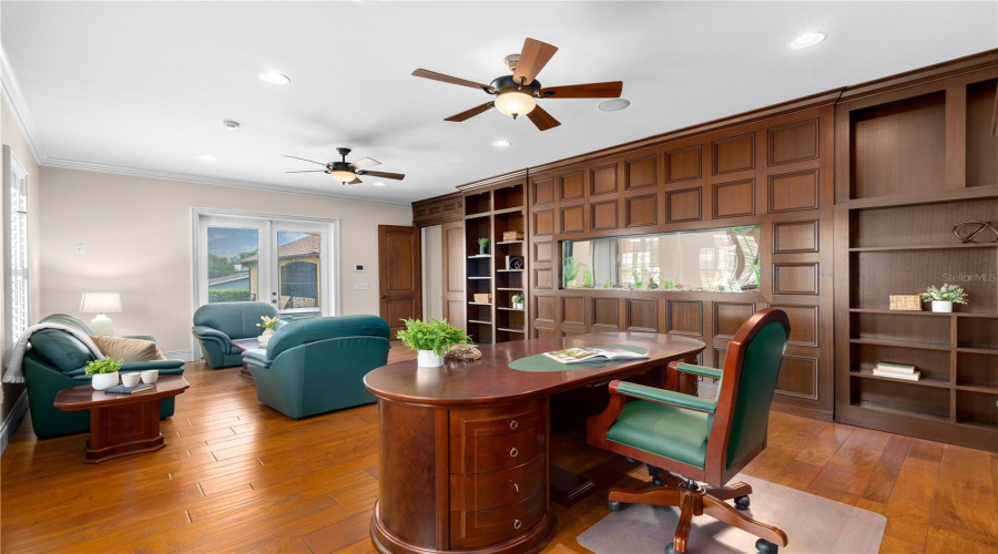 Floor-To-Ceiling Custom Millwork And A Beautifully Integrated Executive Desk Create An Impressive Professional Workspace Within The Private Pavilion.