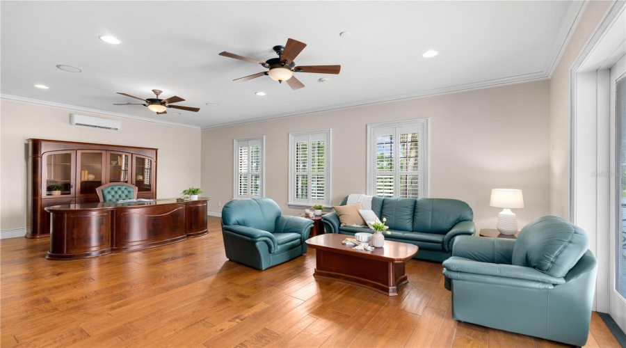 A Sophisticated Executive Lounge And Gathering Room Offers Custom Built-Ins, Hardwood Flooring And Exceptional Flexibility For Private Meetings Or Entertaining.