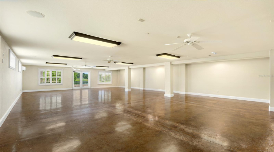 A Truly Extraordinary And Versatile Ballroom Offers Remarkable Scale For Grand Entertaining, Private Events, Wellness, Fitness, Creative Pursuits, Home Learning Or Executive Gatherings — A Signature Feature Of This One-Of-A-Kind Lake Mary Waterfront Estate.