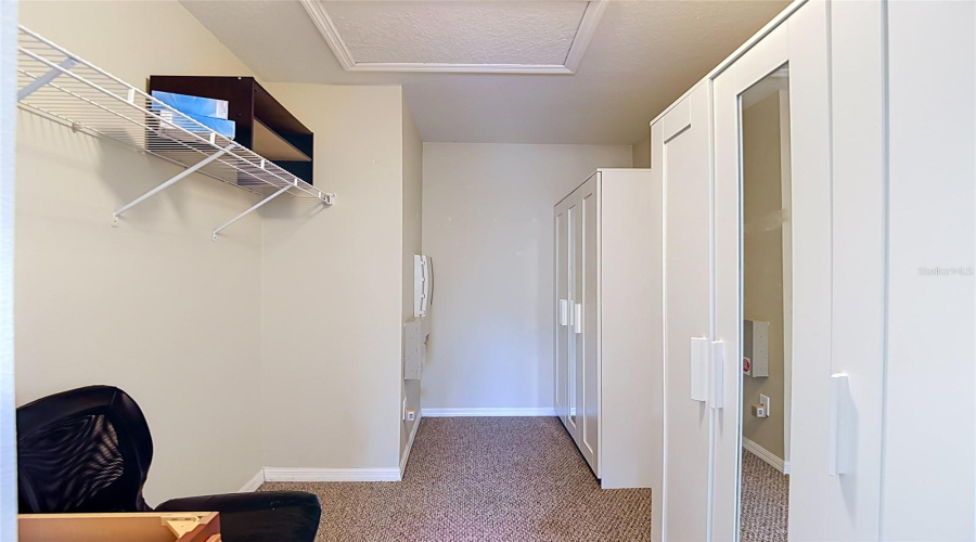 Primary Walk In Closet And Extra Space