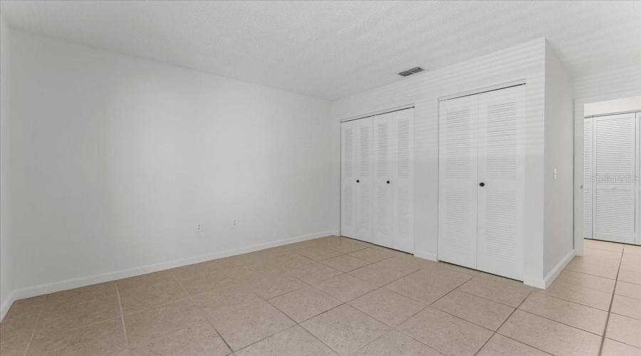 Bedroom 2 With Dual Closets