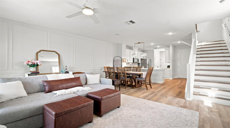 Luxury Lvp Flooring Runs Continously Up The Stairs And On Second Floor.