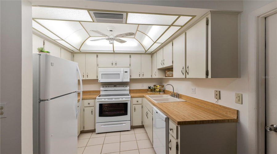 Kitchen With White Appliances