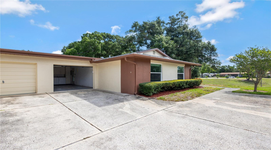End Unit Villa With An Attached Garage.