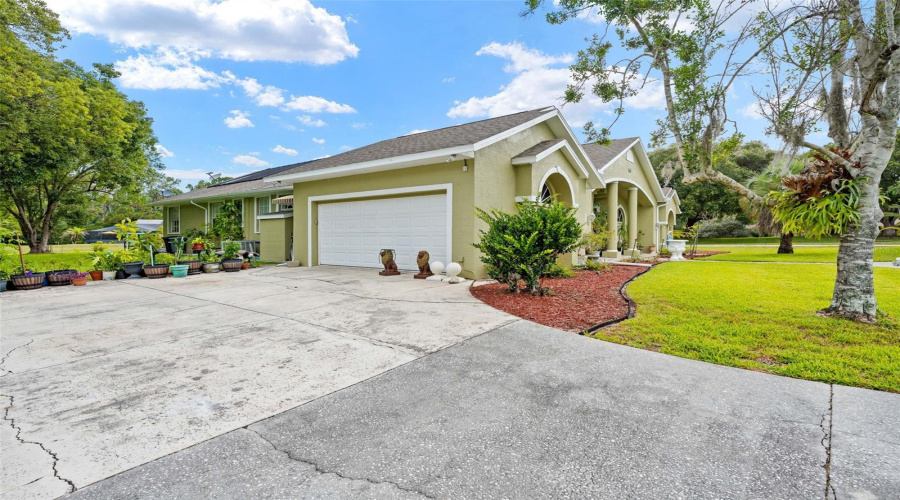 Clean 2 Car Garage With Tile Floor And Window