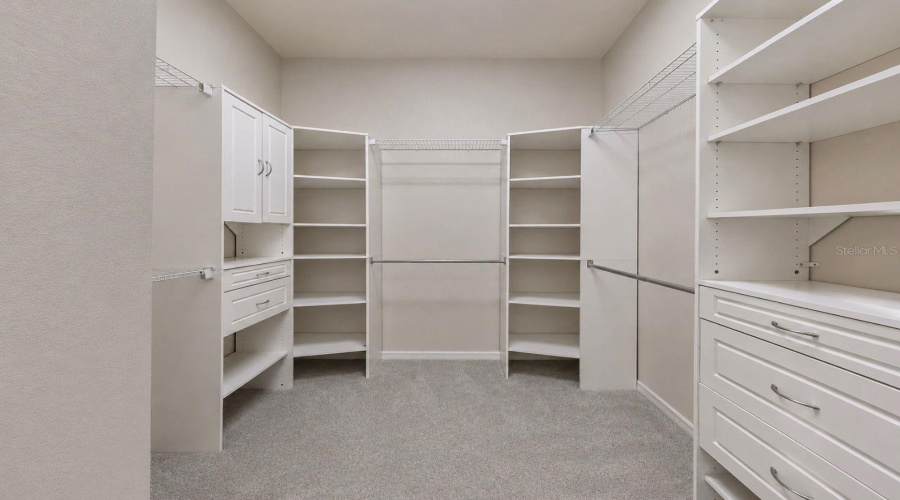 Primary Suite Walk In Closet.