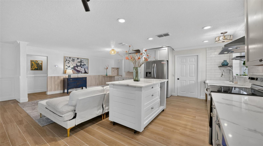 Kitchen Opens To One Of Two Living Areas