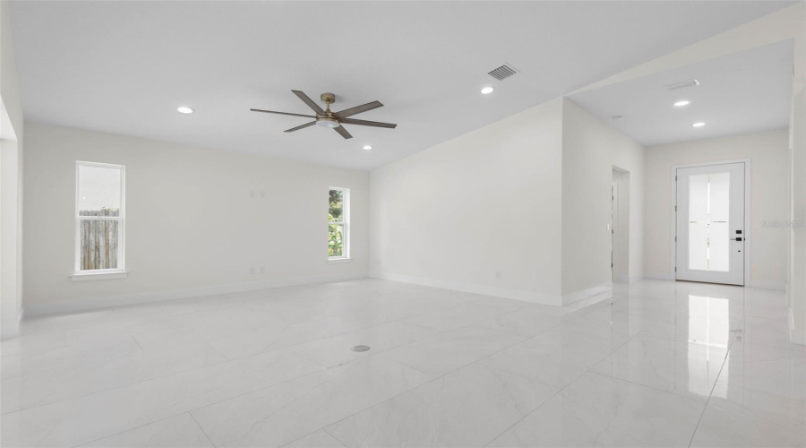 Spacious Entry With High Ceiling And 8' Entry Door