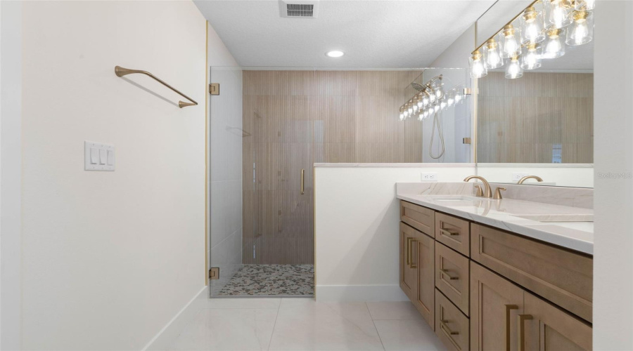 Premium Quartzite Tops &Amp; Elegant Framless Shower Enclosure