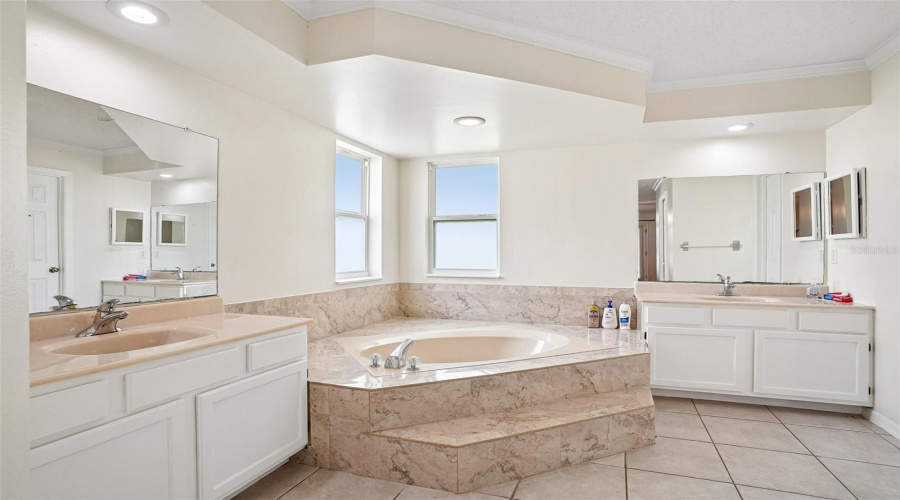 Spacious Bathroom With Bath Tub, Shower And Double Vanity Sinks