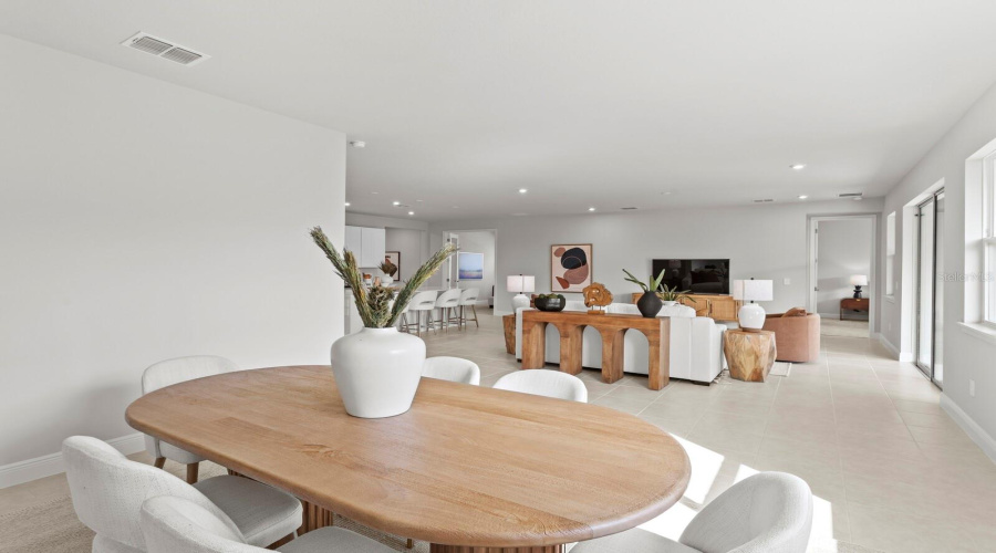 Staged Dining With Living Room View