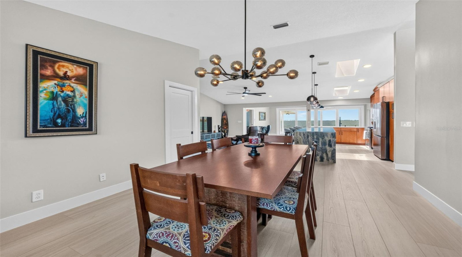 Spacious Dining Room With Easy Access To A Walk-In Pantry, Perfect For Hosting Dinners And Everyday Meals.