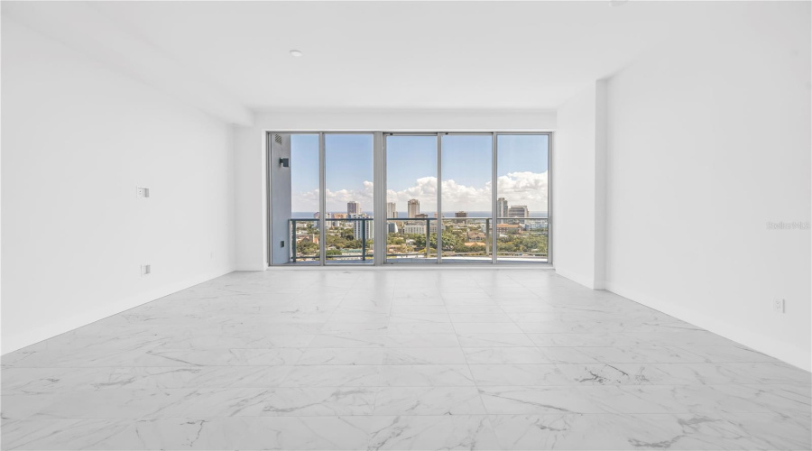 Spacious Primary Bedroom And Floor To Ceiling Views.