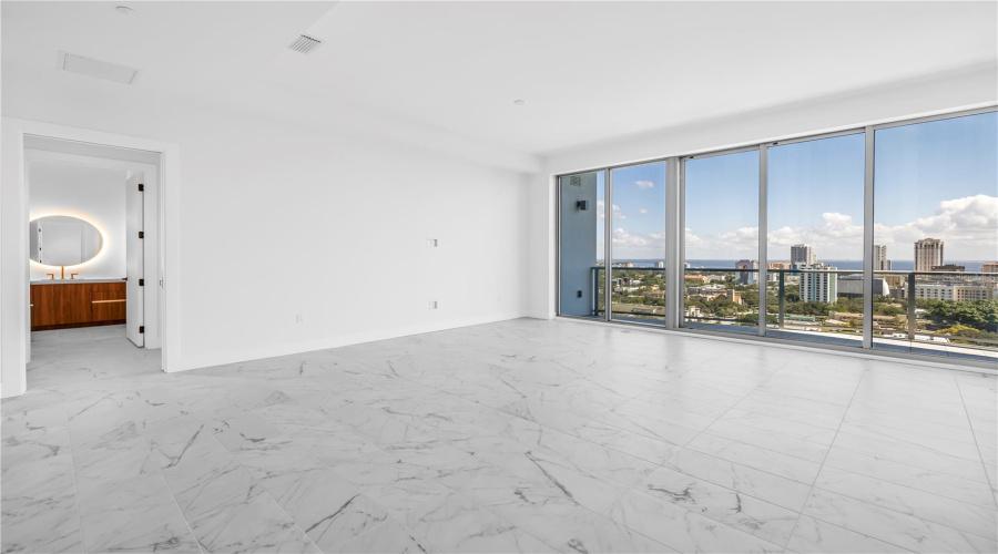 Across The Great Room Is The Second Bedroom And Bath That Could Almost Be Considered Another Primary Suite.
