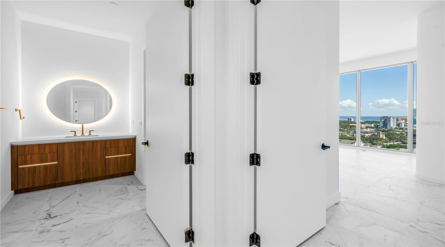 Well Designed Layout Has A Hall Bath That Feels Like An Ensure Because Of The Pocket Door