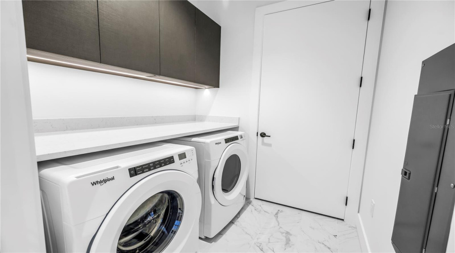 Laundry Room With Whirlpool Washer And Dryer