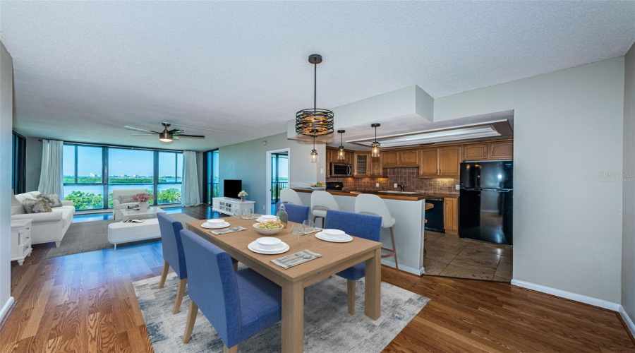Virtually Staged Dining Room Open To Living Room And Kitchen