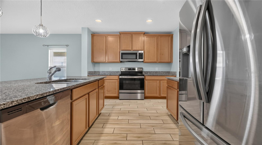 Granite Countertops And Stainless Steel Appliances