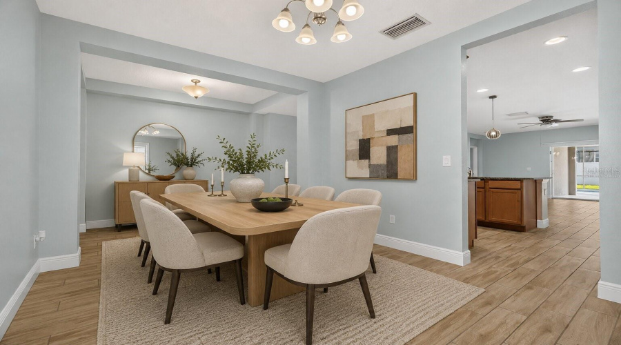 Virtually Staged Dining Area And Entry Way