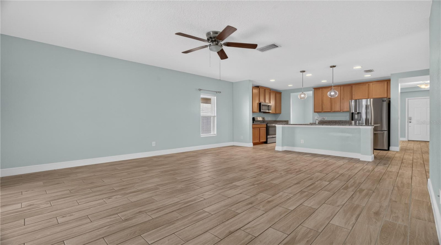 Living Room With The View Of The Kitchen