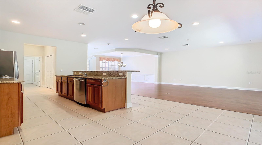 Showing How Open The Kitchen, Living Room And Dining Room Are.