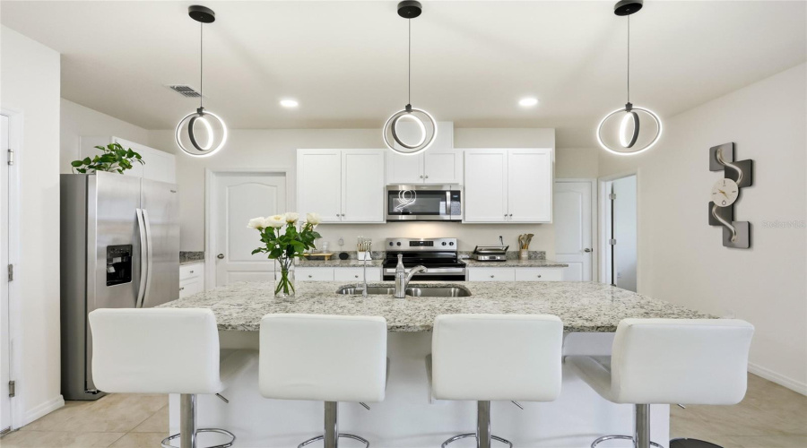 Davenport, Florida 33837, 5 Bedroom Bedrooms, ,3 Bathroombathrooms,Residential,For Sale,Moulin,0,Mfrs5156839