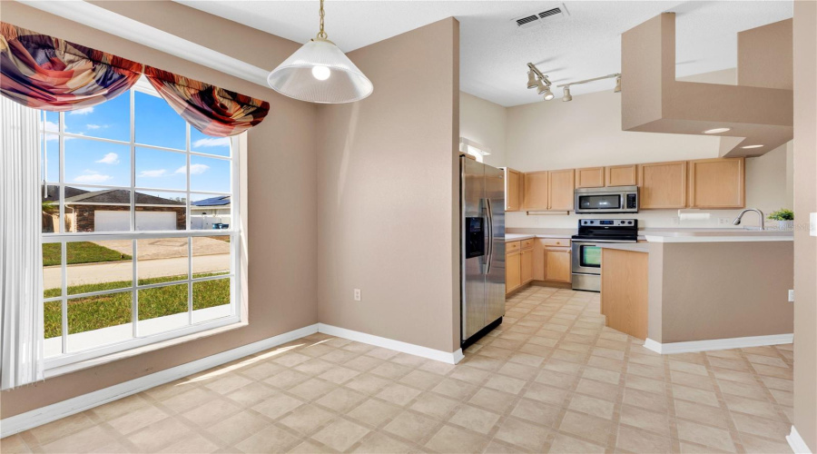 Dining Room And Kitchen View