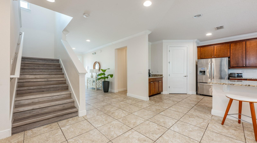 Luxury Vinyl Plank Flooring Blankets The Stairs Leading To The Second Floor.