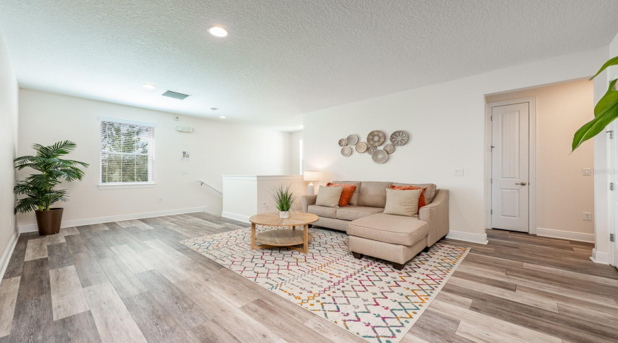 Upstairs, A Spacious Loft Offers Additional Gathering Space, While The Remaining Bedrooms Create A World Of Imagination And Comfort.