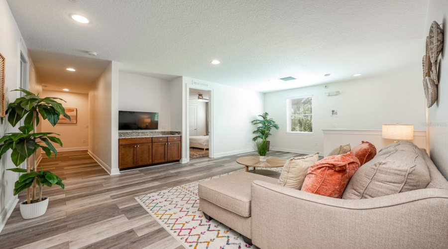 Upstairs, A Spacious Loft Offers Additional Gathering Space, While The Remaining Bedrooms Create A World Of Imagination And Comfort.