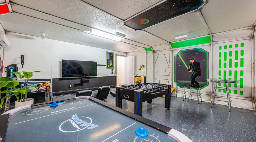 A Fully Themed Game Room Provides Hours Of Entertainment For Guests Of All Ages.