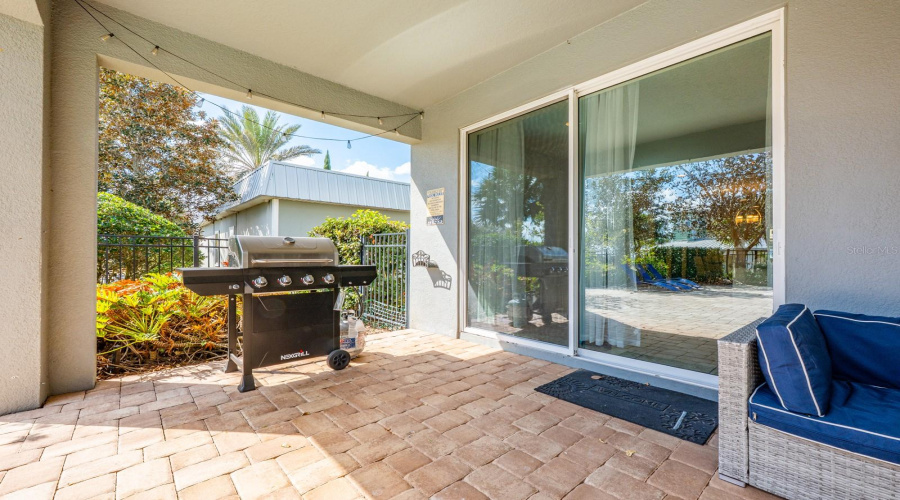 The Living Room Features Sliding Glass Doors That Open To Your Private Outdoor Oasis.