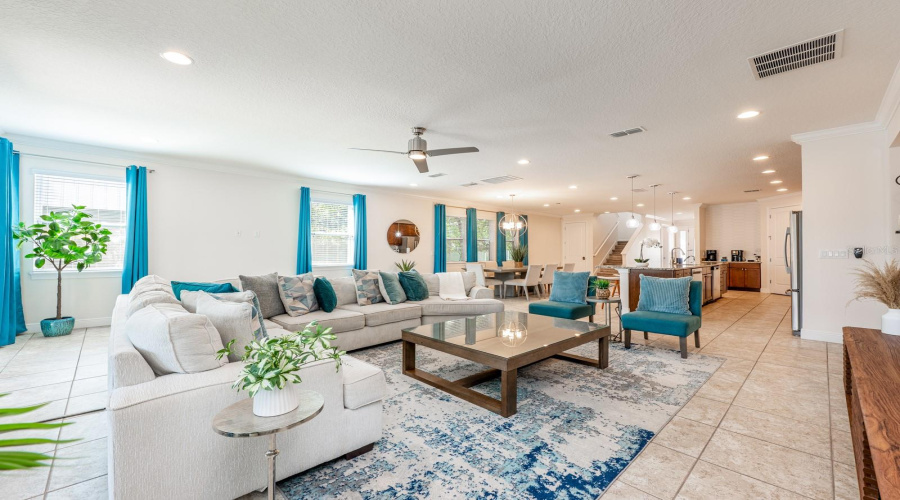 The Expansive Open-Concept Main Floor Seamlessly Blends The Living Room, Dining Area, And Chef'S Kitchen Into One Grand Gathering Space — Ideal For Hosting Large Groups With Ease.