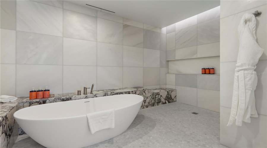 Oversized Wet Room Shower And Tub In Primary Bathroom