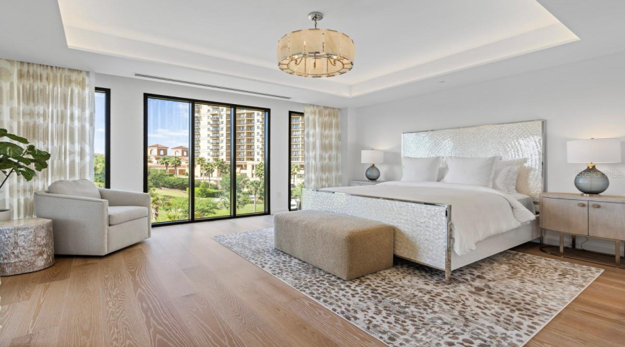 Spacious Primary Suite With Balcony Access.
