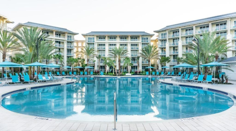 Large Resort Pool Surrounded By Tropical Landscaping In Kissimmee Florida