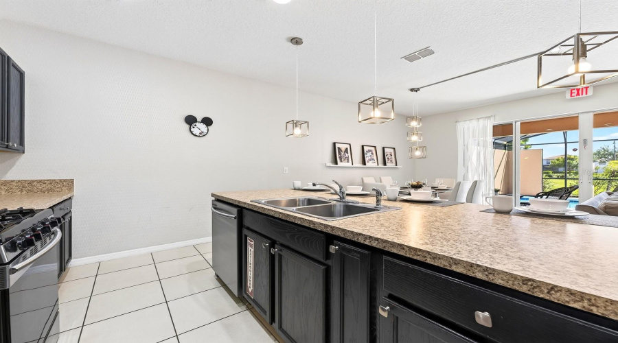 A Generous Center Island Offers Extra Prep Space And Room For Counter-Height Seating.