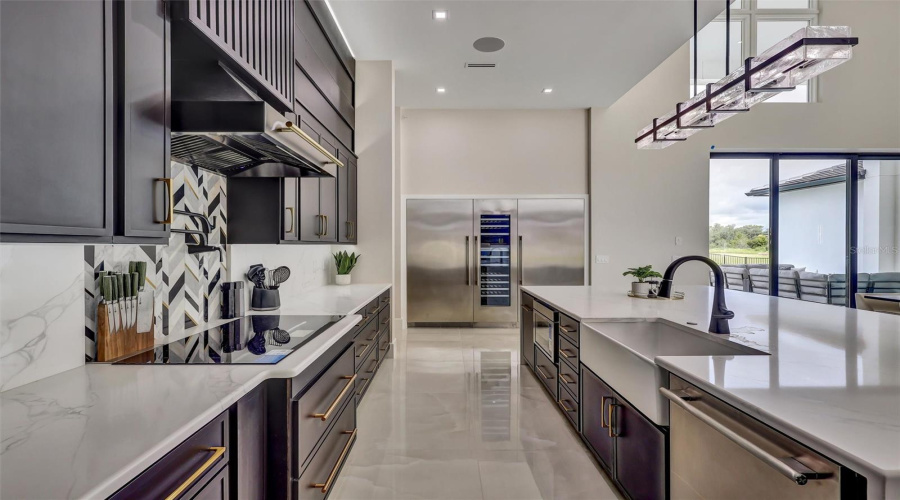 Beautifully Appointed Kitchen With Abundant Preparation And Storage Space. Thermador Appliances Including A Temperature Controlled Wine Colum