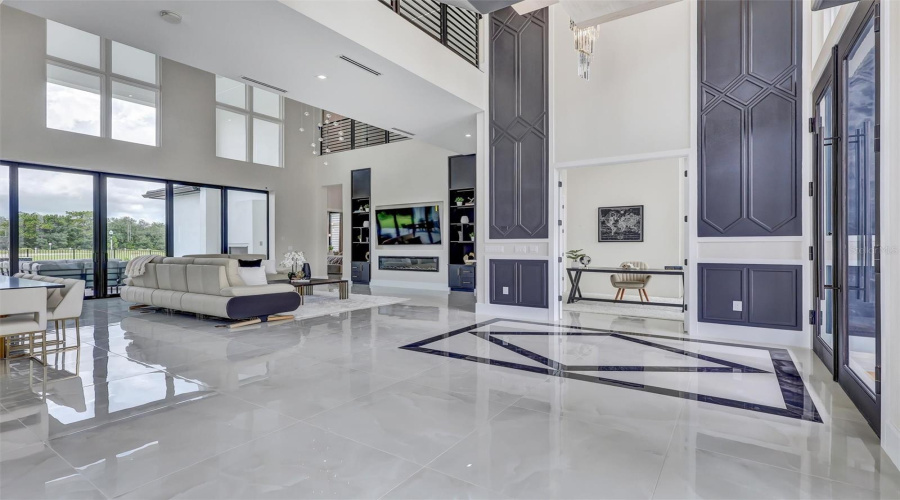 Grand Interior Proportions And Abundant Natural Light Define The Main Living Spaces