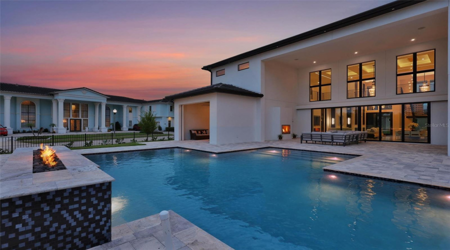Resort-Style Outdoor Living Comes Alive At Sunset